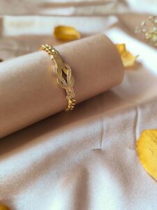 عکس و قیمت دستبند استیل طلایی زنانه – طرح کارتیه لاکچری