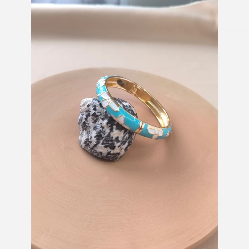 دستبند استیل طرح گل با رنگ آبی فیروزهای – ترکیب ظرافت و خاصپسندی