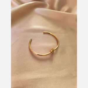 عکس و قیمت دستبند بنگل گره‌ای طلایی استیل ضد زنگ – ظرافت و ماندگاری در یک طرح خاص